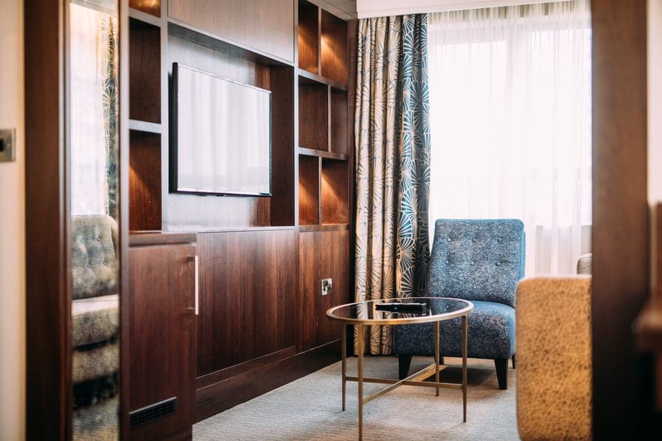 Junior Suite, 1 King Bed (Additional Living Area) | In-room safe, desk, iron/ironing board, free WiFi