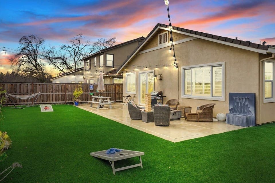 Your pets, kids, friends and family will fall in love with this back yard! Fully fenced, fake turf, market lights, BBQ and Gas fire pit