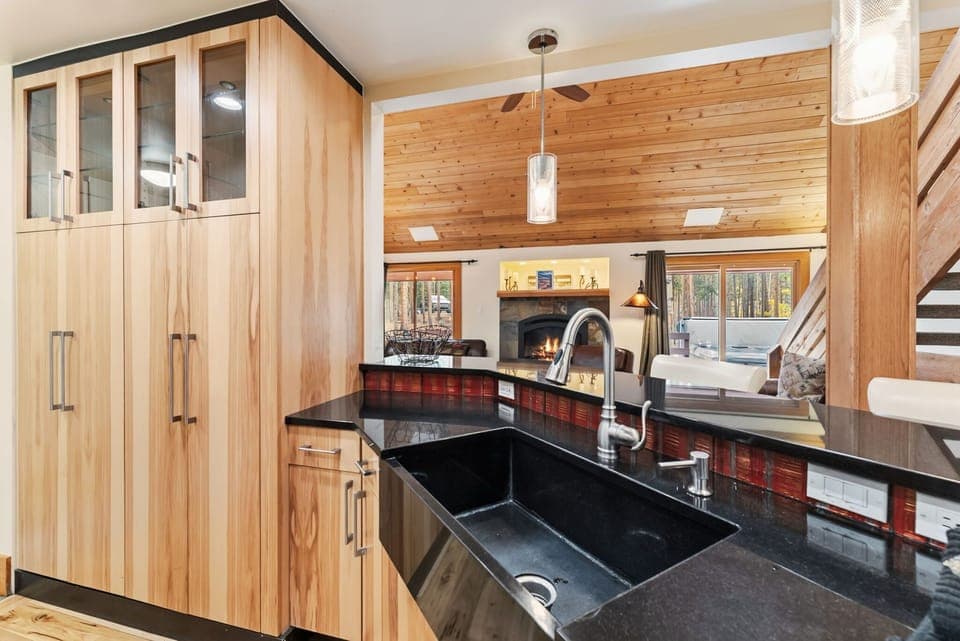 Kitchen: Viking appliances, drip coffee maker, Keurig, cooking utensils, tableware, bar seating