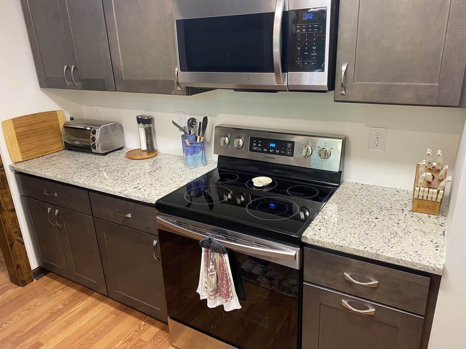Kitchen is well-stocked with everything you need to cook at home.