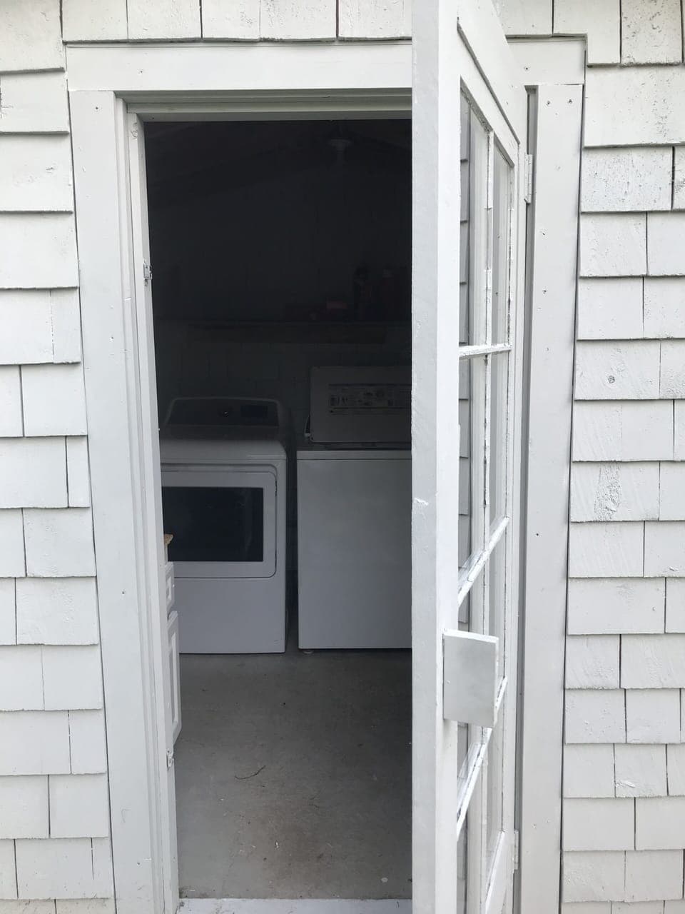 Washer and dryer on the south side of the house. 