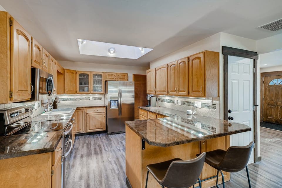Main level kitchen, 1 of 2. Fully stocked including Keurig+coffee, blender, etc.
