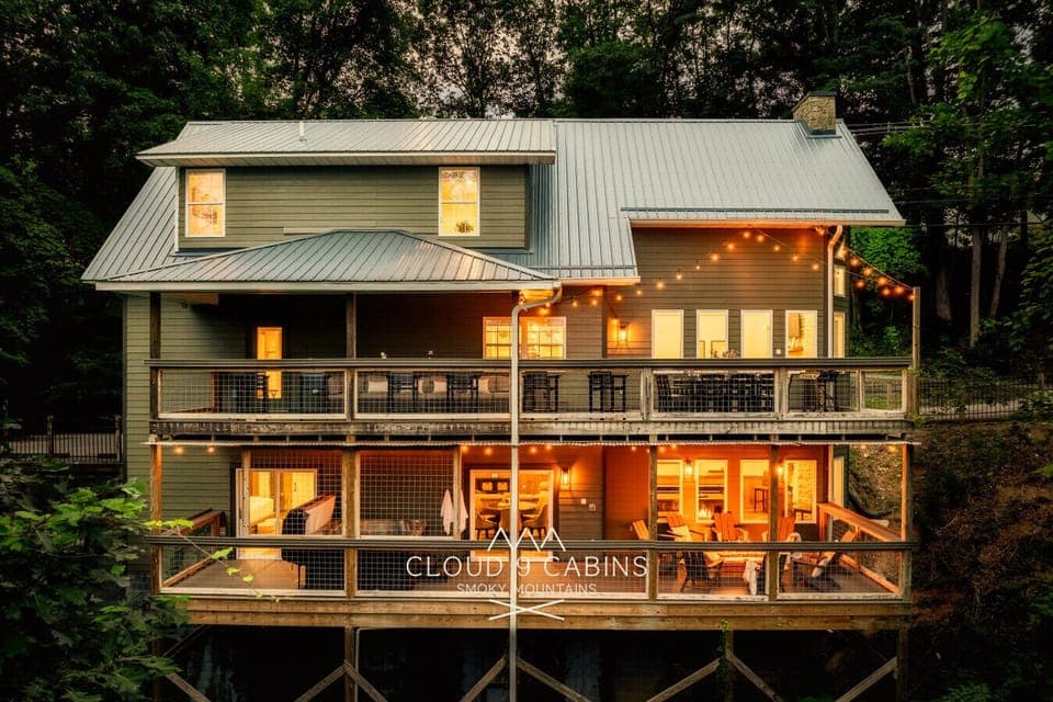 Back decks include a custom fire pit, hot tub, outdoor dining and plenty of comfortable seating!