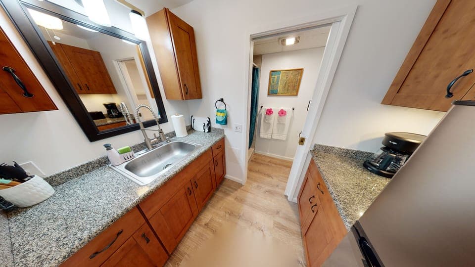 Kitchen with medium size refrigerator 