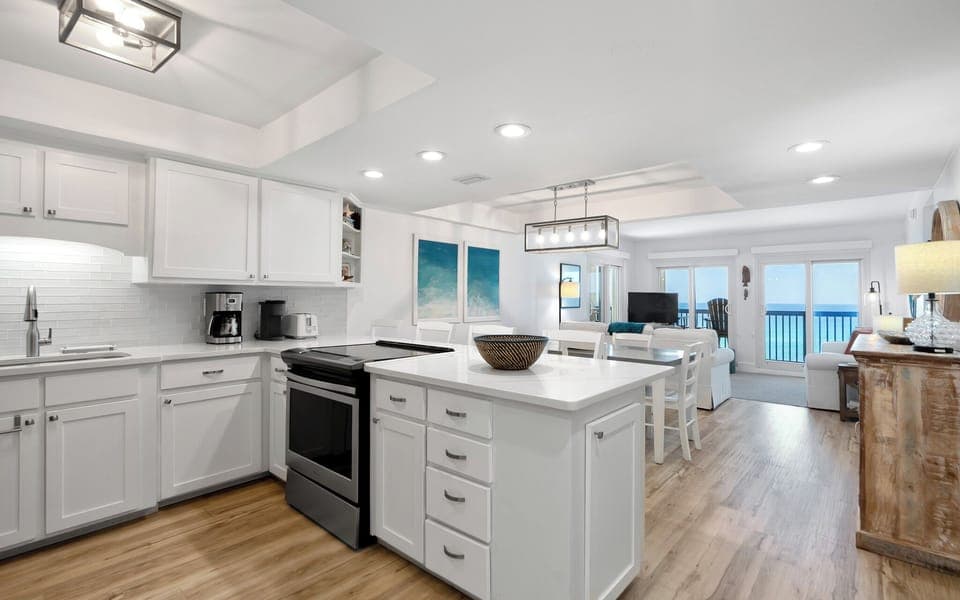 Your spacious kitchen flows seamlessly into the living area, where you'll love cooking with ocean views through the large windows.