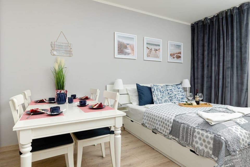 Large table with chairs for eating communal meals. 