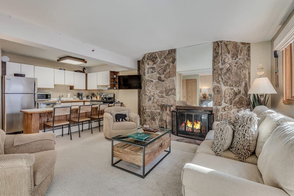 Living room with wood-burning fireplace