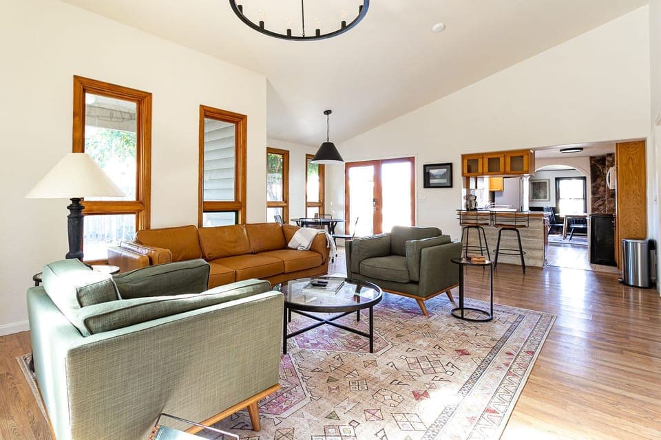 Bright and cheery living room. Perfect for family gatherings and movie night!