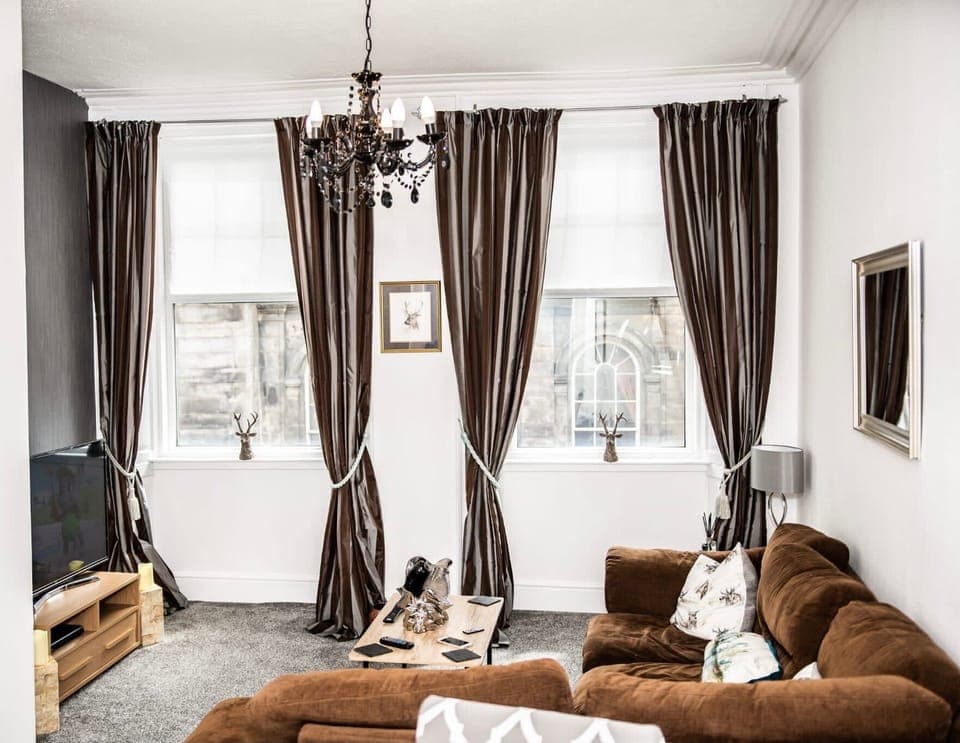 Apartment | Living room | 30-inch TV with cable channels