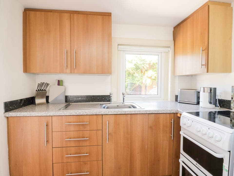 Fridge, electric kettle, toaster, cookware/dishes/utensils