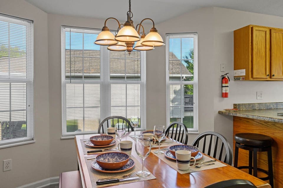 The dining table seats six guests.