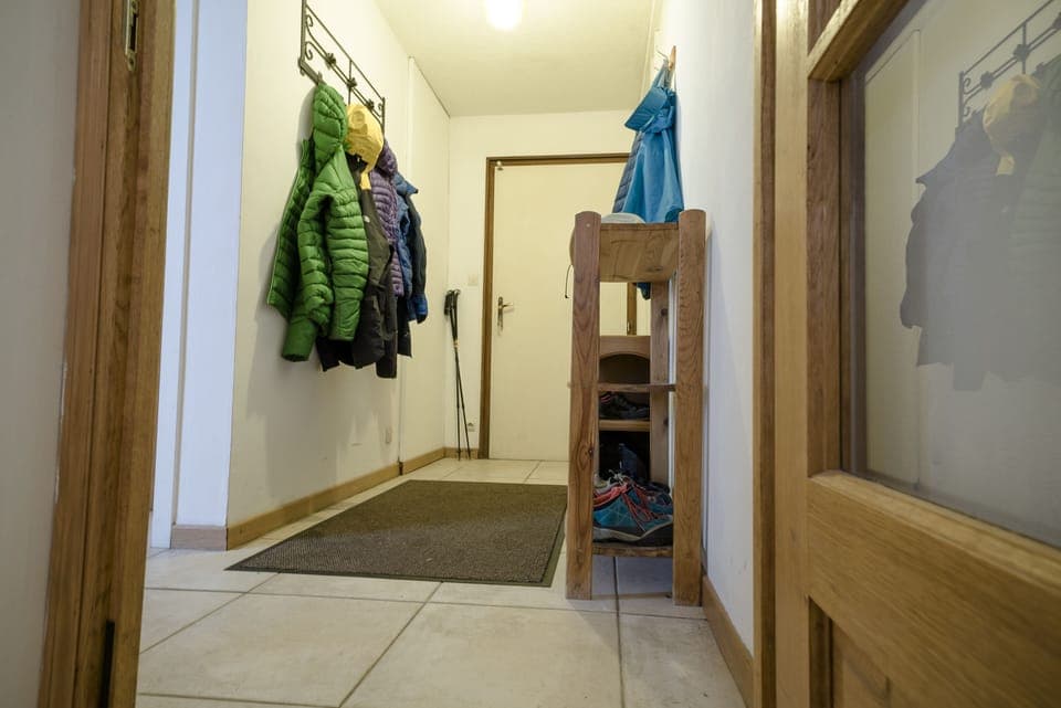 Entrance Hallway. Plenty of coat hooks and shelves for shoes.
