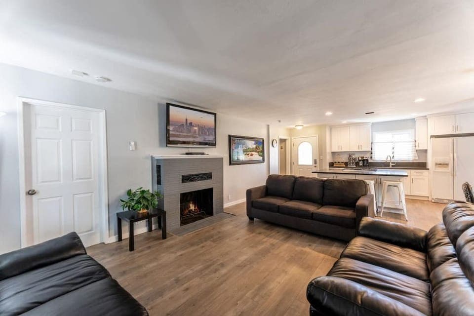 Living room with TV and sofa couch. Open concept.