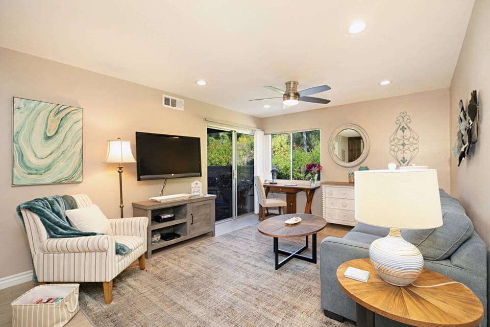 Living room with comfortable seating and TV