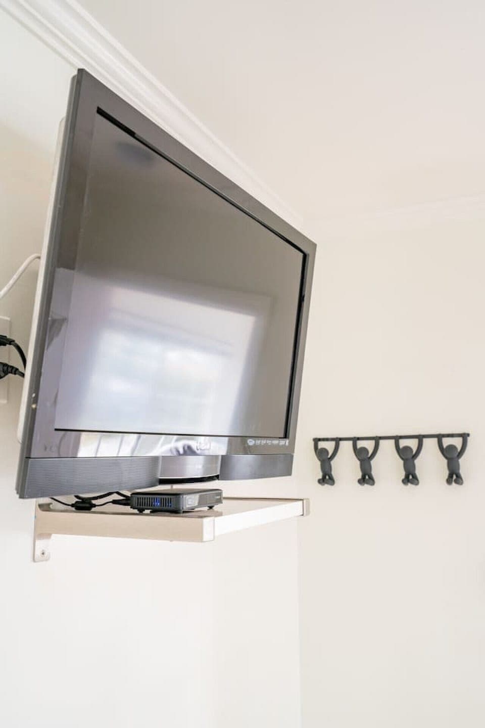 Bedroom has a queen-size bed, TV with Cable, ceiling fan, ample storage space, en suite, and portable AC unit (one unit for the whole cottage).