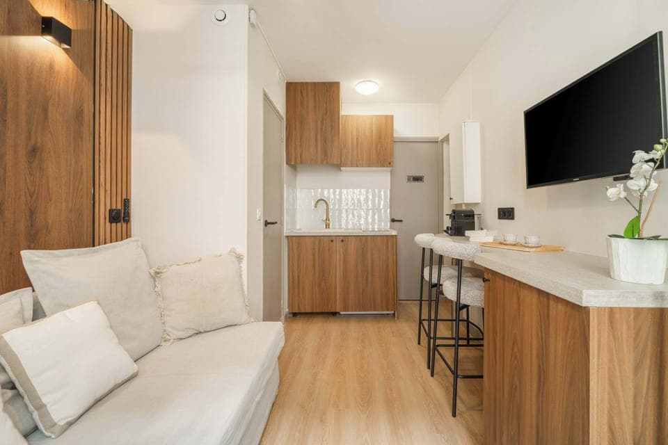 The studio’s sofa easily turns into a double bed for film nights.