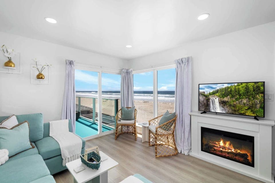 Living area w/ electric indoor fireplace heater and smart tv w/ app streaming only. 