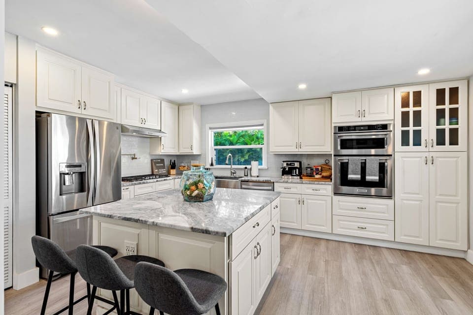 Fully stocked kitchen w/top of the line stainless steal appliances.