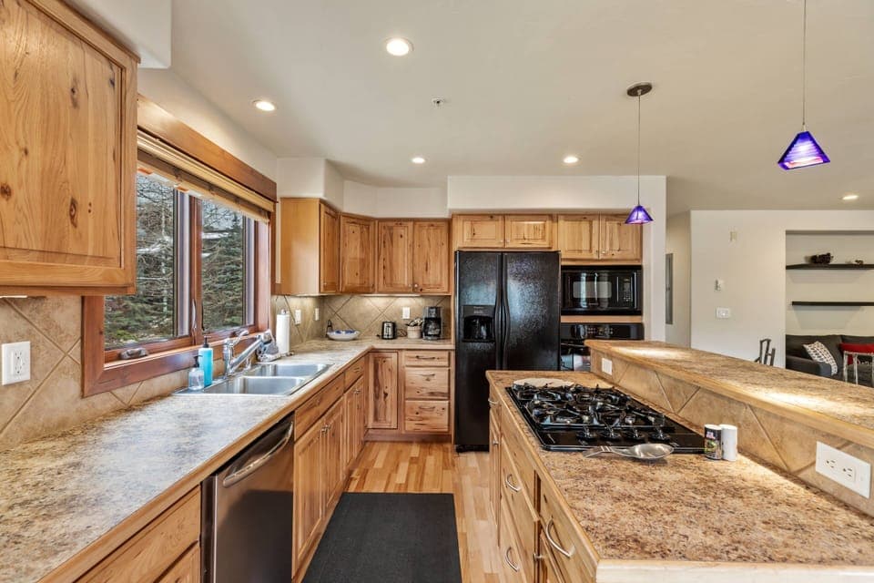Spacious, fully stock kitchen - Great open plan so you can prepare food while being part of the conversation!