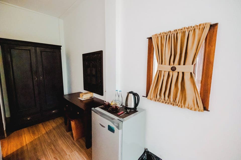 Superior Twin Room | Minibar, in-room safe, desk, iron/ironing board