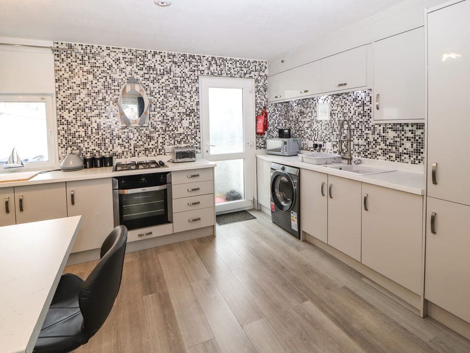 Fridge, electric kettle, toaster, cookware/dishes/utensils