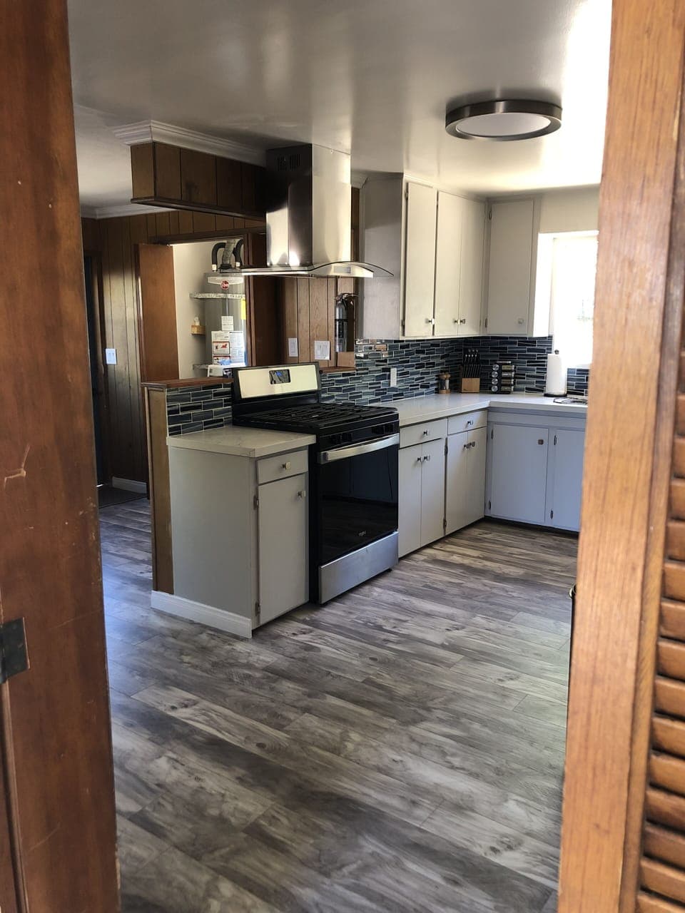 Kitchen looking towards laundry.