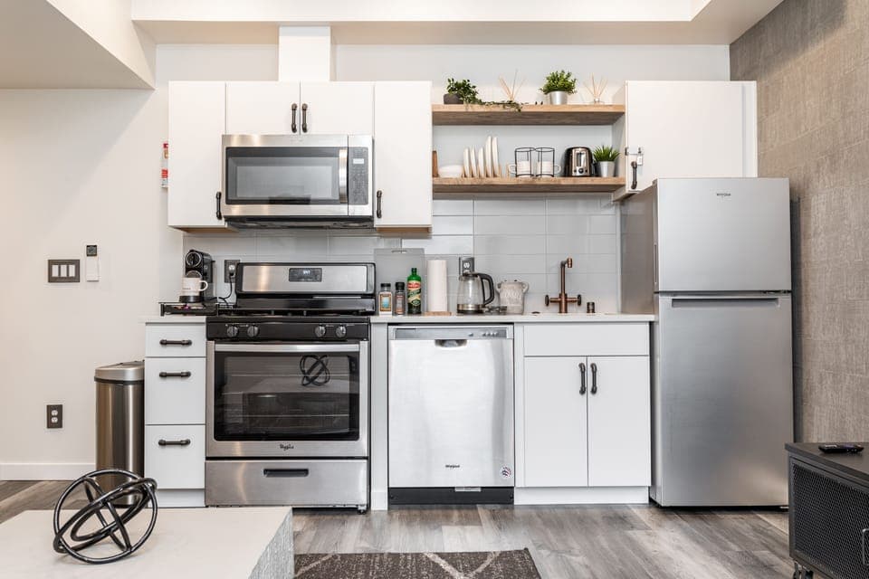 Our Kitchen is stocked w/ Utensils, Plates and everything you need for a dinner