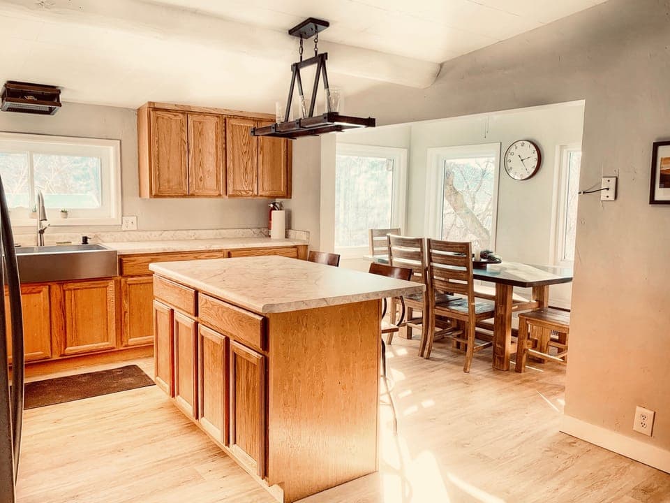 Light and bright with new appliances. Bar and dining seating. Open floor plan 