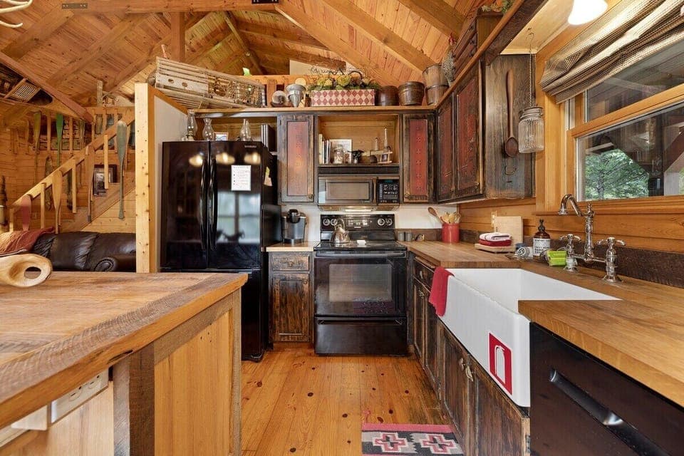 To the left of the living room, you'll find our fully stocked kitchen - perfect for whipping up your favorite meal or baked goods.