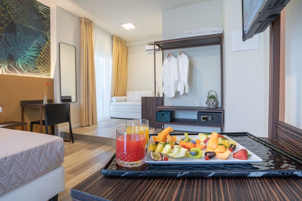 Quadruple Room, Balcony | In-room safe, desk, blackout drapes, free WiFi