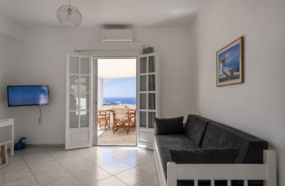 Apartment | Living area | 32-inch flat-screen TV with cable channels, TV