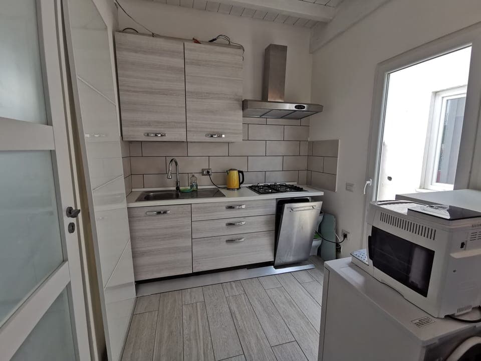Apartment | Private kitchen | Fridge, stovetop, dishwasher, electric kettle