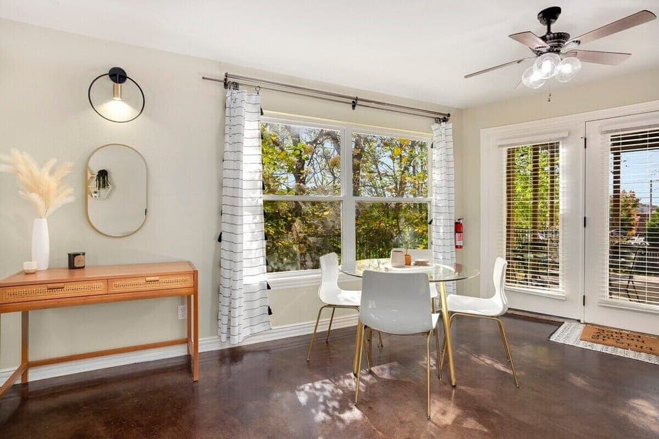 Between the two spaces, find our 4-top dining table.