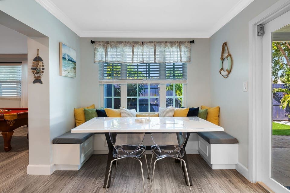 breakfast nook with built in bench - perfect for playing games - we have tons!