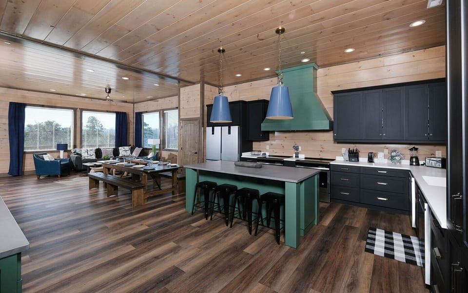 Large Kitchen with Island Seating and a Dinning Room Table