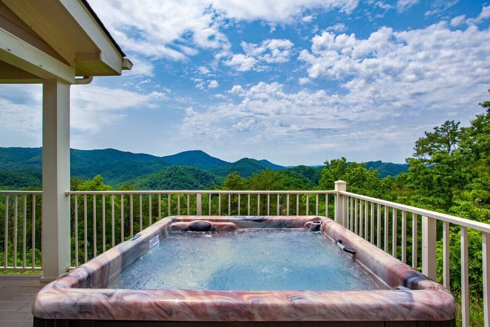 Unwind in the hot tub with incredible mountain views all around.