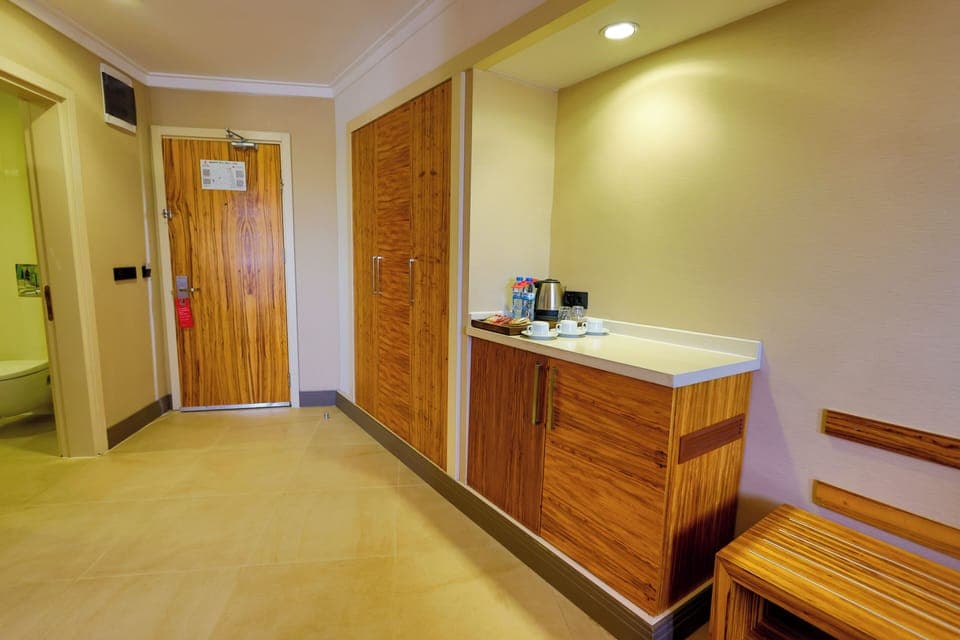Junior Suite, Non Smoking (1 Queen Bed, 2 Single Beds) | Premium bedding, in-room safe, desk, laptop workspace