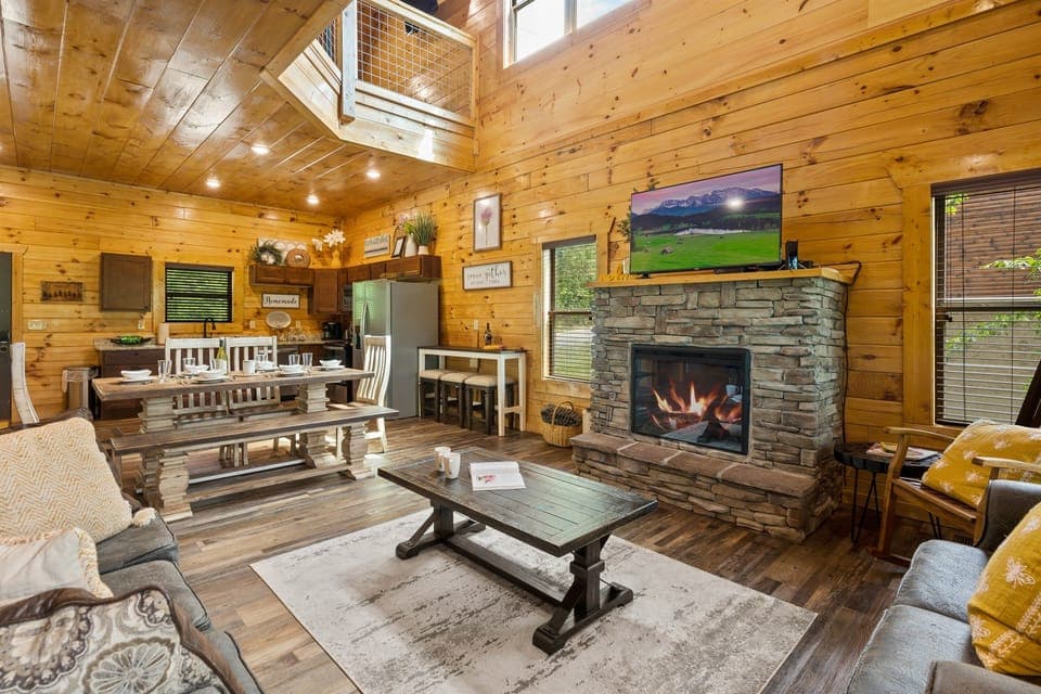 Get ready to be wowed by our stunning open concept living space, complete with everything you need to make your cabin stay unforgettable.
