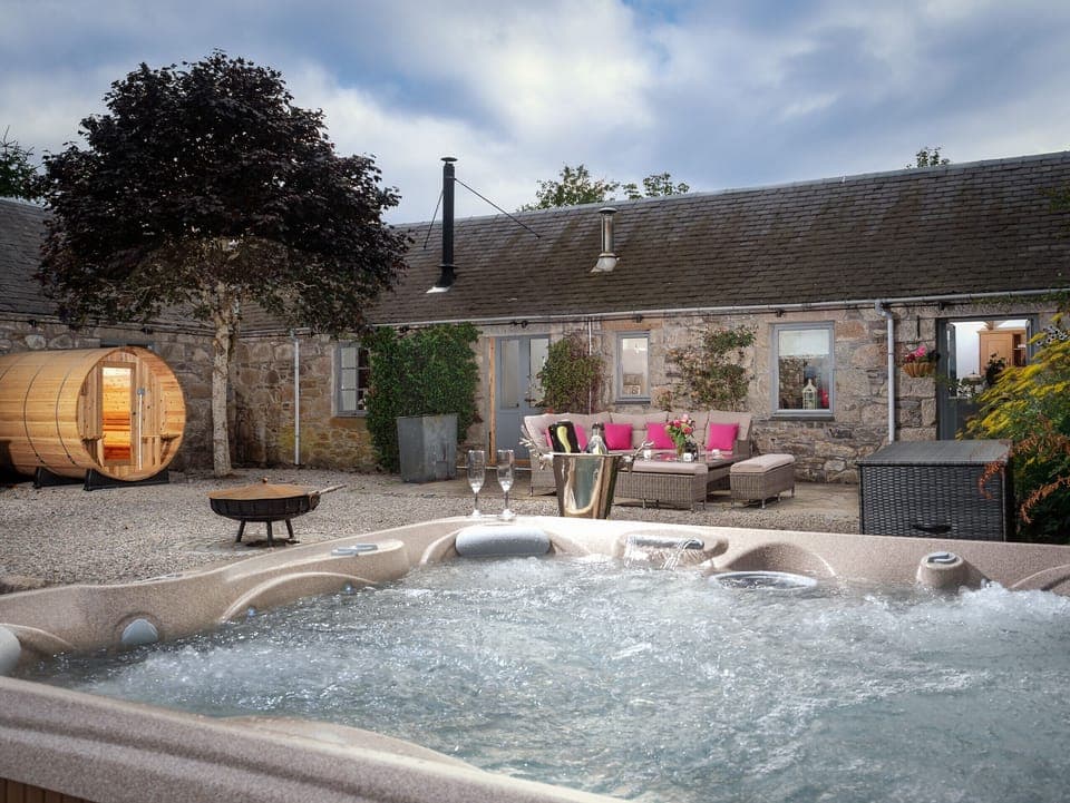 enjoy the hot tub, sauna, fire pit and outdoor seating