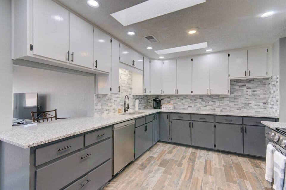 Full kitchen with gas stove, microwave, refrigerator, and dishwasher