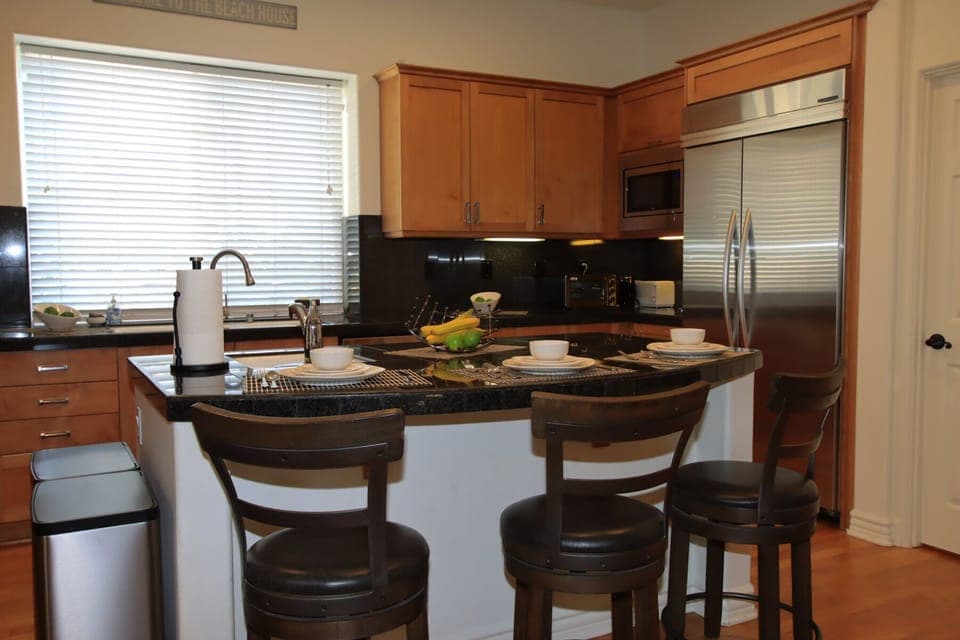 Kitchen with everything you can imagine, two sinks to keep conversation going.