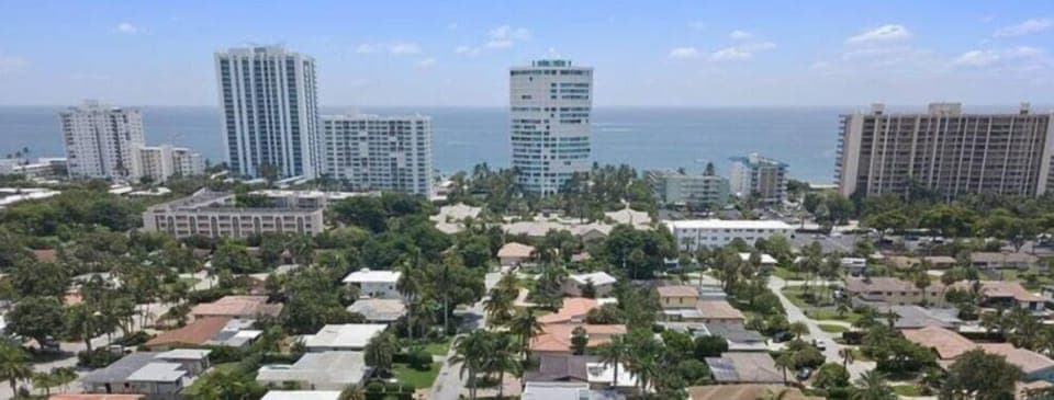 Arial view of the home in relation to A1A- 12 minute walk to beach. 