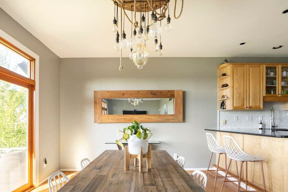 Dining area has plenty of seating with views overlooking the city skyline.