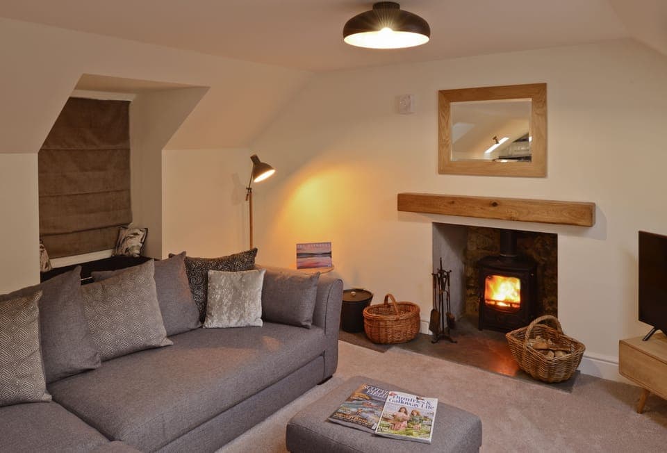 Cosy sitting room with wood stove