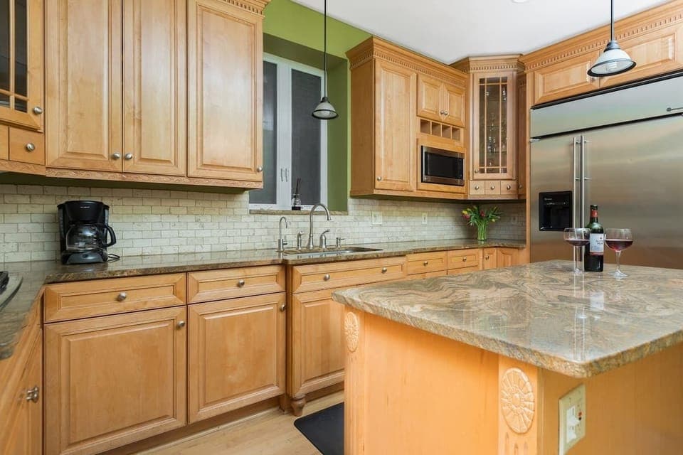 Kitchen is fully stocked with all dishware, cutlery, and bakeware