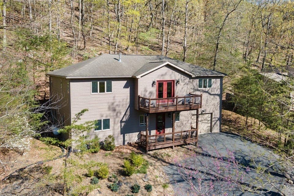 6 bedroom home nestled up in the mountain looking at the ski slopes.