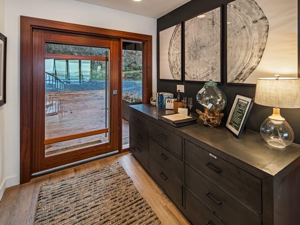 Elegant entry way with pivot hinge door 

<b>This house has a outside, front door security camera facing the parking area</b>