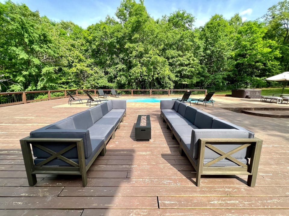 Comfortable, modern couch set with a propane fire pit.