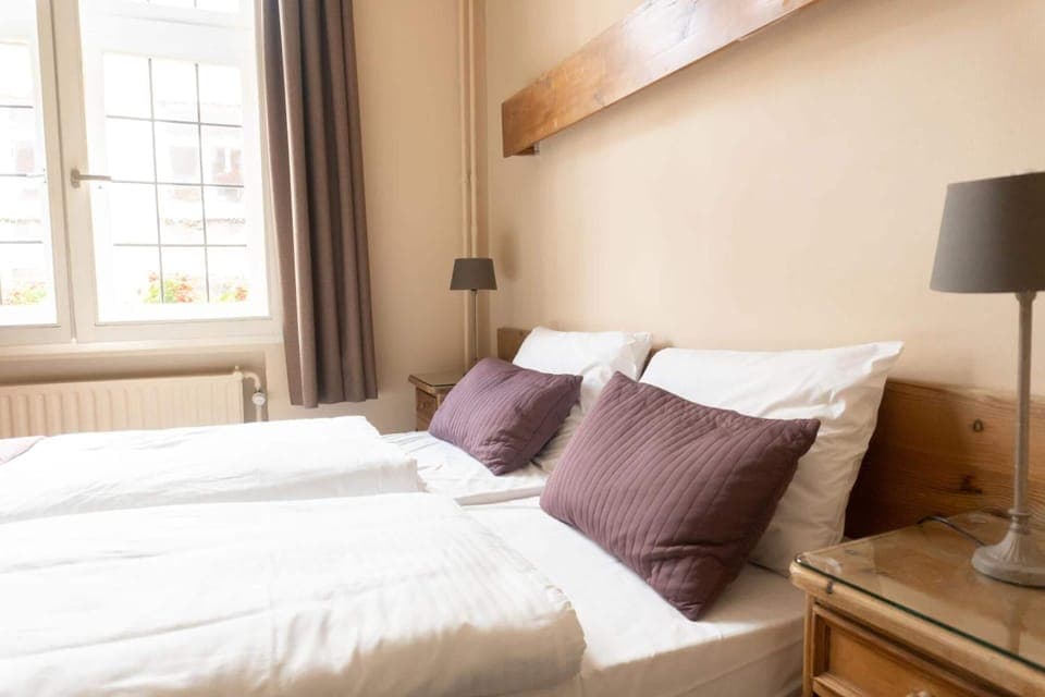 Desk, free WiFi, bed sheets