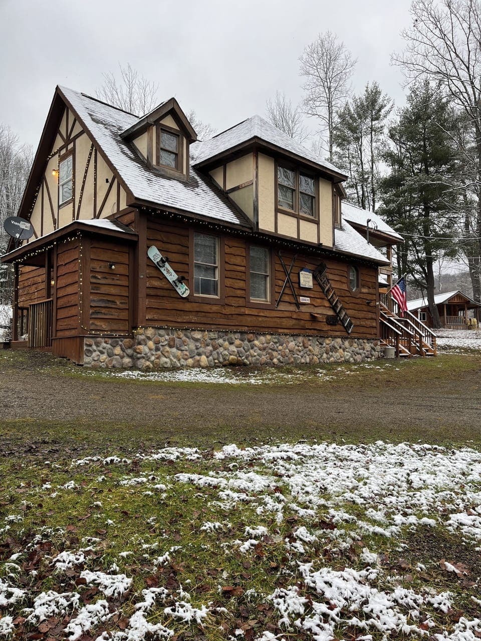 Exterior view of front/side of home from parking lot direction.